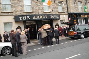 Jim's remains are taken into the Abbey for the wake today: Pic Paul O'Sullivan