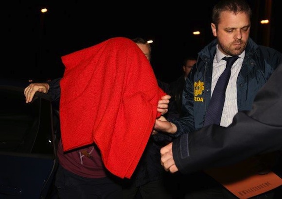 Julian Cuddihy being led into Ballyshannon Court tonight by Detective Garda Bernard Mullins. Pic copyright North West News Pix.