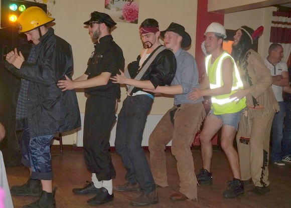  The huge crowd in Friel’s could barely contain their excitement when these lads from the Raphoe Town FC team appeared as The Village People for the last act of the night. 