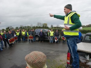 Donegal IFA Chairman PJ McMonagle giving instructions to  the members of Donegal IFA as they blockade the Donegal / Foyle Meat's Factory Carrigans as part of there nationwide protest at the low prices being paid for cattle. Photo- Clive Wasson
