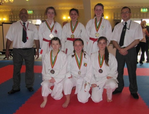 Laura Browne and Elaine Dullaghan take gold with their team mate in team kumite