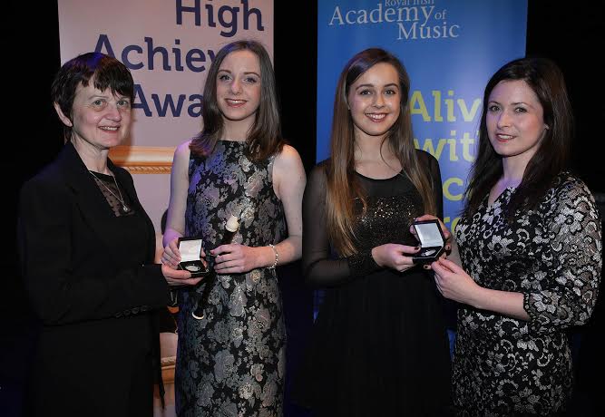 Aoife Walsh (Carndonagh) and Jessica O'Brien (Malin), pictured receiving their High Achiever's Awards from the Royal Irish Academy of Music at the Waterside Theatre, Derry on Sunday last, from Theresa Doyle, Local Centre Manager, Royal Irish Academy of Music (left) and Dr. Jennifer McCay, Chair of Senior Examiners, Royal Irish Academy of Music.