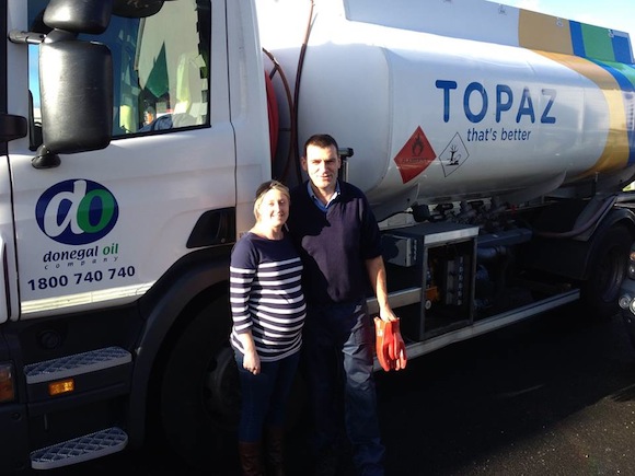 Patricia takes delivery of her free oil from Donegal Oil Company.