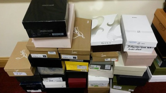 Some of the many boxes of designer shoes which will be offered at the designer pop-up shop in Letterkenny this weekend. 