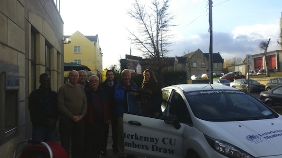 Members of Letterkenny Credit Union committee with Emma and her new car.