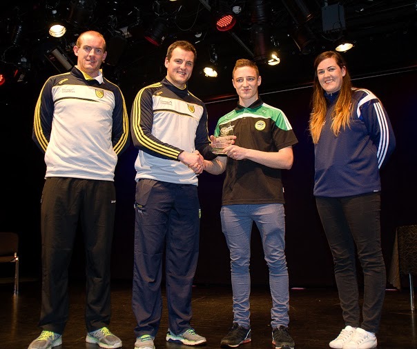 Cormac Callaghan receives The Special Achievment Award from Michael Murphy.