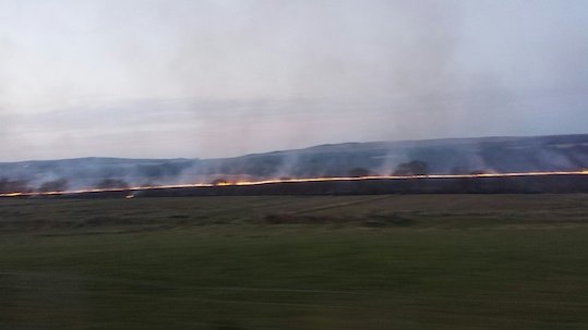The line of gorse fire rips through the Donegal countryside last night. Pic by Niall Mulrine.
