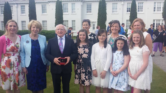 Volunteers and founding members of the Childhood Cancer Foundation pictured at the President’s Summer Garden Party were from left: Virginia Murray, Mrs Sabine Higgins, President Michael D Higgins, Ciara Murray, Niamh Richard, Emer Toner and Alice Rennick. Back row from left: Maura Toner, Aine Richard and Mary Claire Rennick.