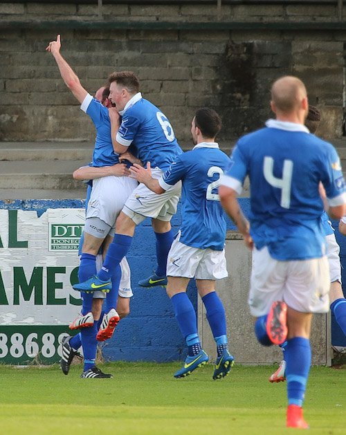 Funston is surrounded by his team-mates after scoring his latest screamer! Pic by Northwest Newspix.