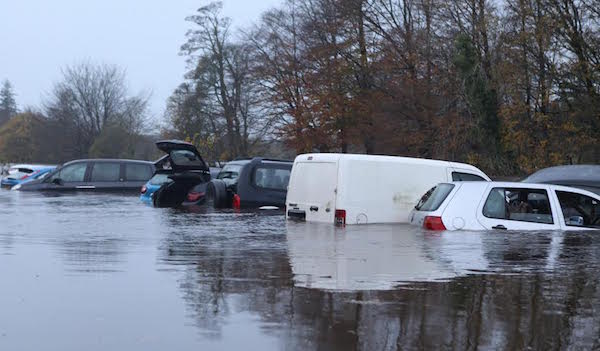 CARS DESTROYED AND FIELDS FLOODED AFTER NIGHT OF TORRENTIAL RAIN ...