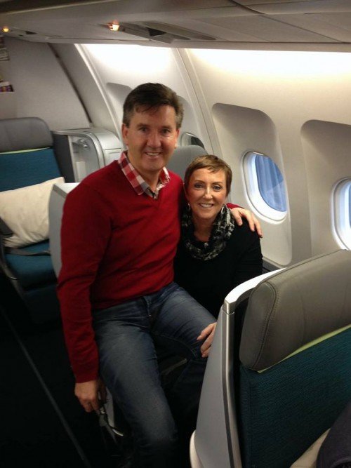 Daniel and Majella on board the plane taking them from Dubliln to LA to start their world cruise