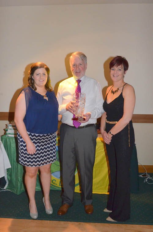 Hugh Mc Clafferty receives an Appreciation Award from the Ladies Committee Deirdre Mc Daid and Pauline Carberry