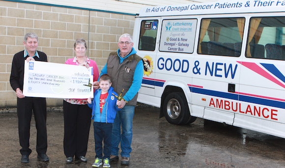 Joe and Marie Bovaird along with Josh Goldrick presenting a cheque for €1987 to Eammon McDevitt on behalf of the Galway Cancer Bus the money was raised from Joe's annual St Bridget Crosses. Joe has been making St Bridget Crosses for the last 48 years and donating the money to local charities in Donegal.