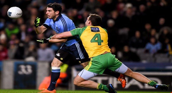 Ciaran Gillespie tackles Bernard Brogan during Donegal's defeat to Dublin on Saturday night at Croke Park.