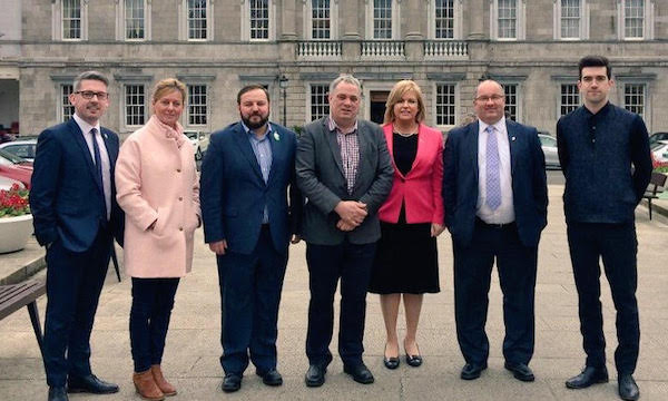 Pádraig Mac Lochlainn, third from left pictured with the other Sinn Féin candidates in the Seanad election outside Leinster House yesterday.