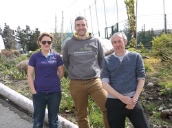 Gareth Austin pictured with Joanne Butler and Gweedore man John Ferry in the Ionad Naomh Padraig community garden in Dore