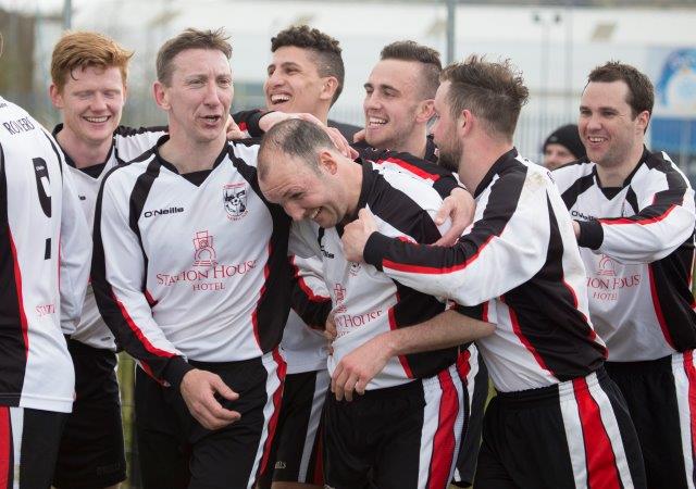 Terence Shiels is congratulated by his team-mates after he scored the winner. Pic by Northwest Newspix.