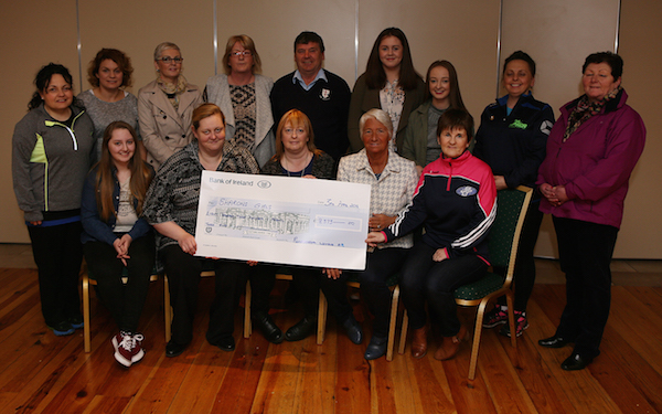 Pictured at the presentation from the Annual Run Donegal Womans's 5k, which this year was in Aid of "Sharon's Girls,". A cheque for €8,373 which was presented by Grace Boyle, included seated were, Kayleigh Alexander, Mary Gallen, Brid Alexander Grace Boyle and Bredgeen Doherty, back roy from Left are, Bernadine Madden, Louise Gouidie, Marcella Mc Bride, Anne Marley, Neil Martin, Emma Gallan, Niamh Alexander, Nicola Kee, and Rosemary Foy Photo By Brian McDaid