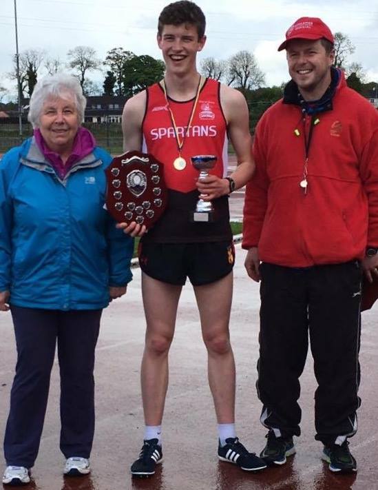 Fintan Stewart winner of Paddy O Donnell male 800m race with Paddys wife and son Mary and Martin O Donnell