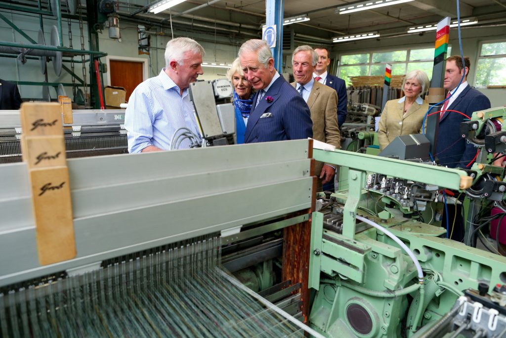 25/05/2016 NO REPRO FEE, MAXWELLS DUBLIN, IRELAND Visit to Ireland by The Prince of Wales and the Duchess of Cornwall. Donegal, Ireland. Pic Shows: HRH The Prince of Wales and the Duchess of Cornwall being shown how the tweed is made with Mr. Lynn Temple, Ms. Elizabeth Temple and Mr. Patrick Temple Proprietors and Directors at Magee of Donegal Tweed Workshop and Factory. PIC: NO FEE, MAXWELLPHOTOGRAPHY.IE