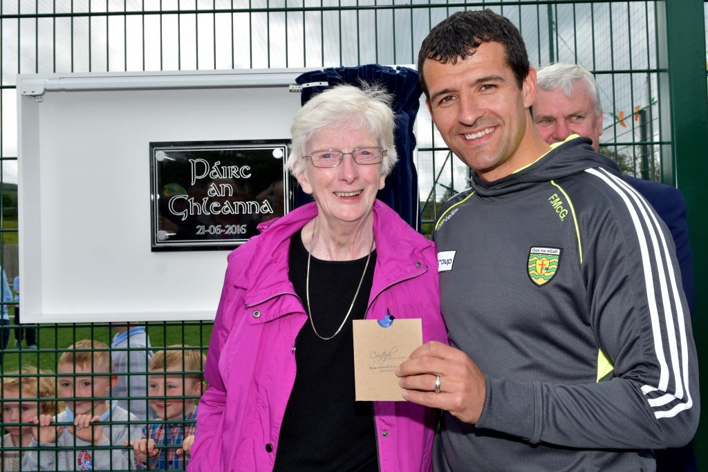 Frank Mc Glynn with Sally Mc Clafferty who won the prize for choosing the name of the new Astro Turf pitch at Strath Mor