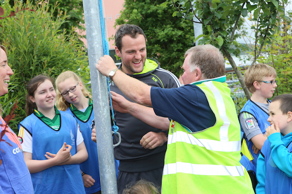 Give me that.. Special guest Michael Murphy shares yarn with Charlie O'Kane at the raising of the Active Blue Flag  at the school at Glenswilly National School.Photo David Mc Daid/Cristeph