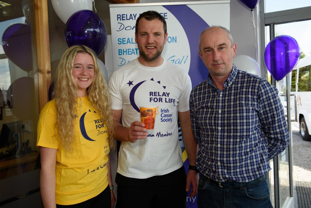Hanna O'Kane and Denis O'Kane, Bellagio Coofee with Michael Murphy at the Inisowen Motors Relay for Life Coffee morning at there garage in Drumkeen, Letterkenny. Photo Clive Wasson