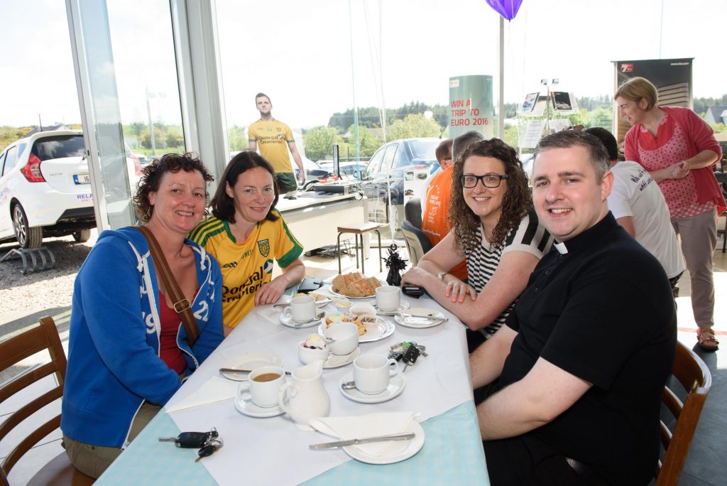 Elaine McDermott, Stephnie Friel, Tracey McBride and Fr. Stephen Gorman, Druumkeen NS Golf Classic Committee at the Inisowen Motors Relay for Life Coffee morning at there garage in Drumkeen, Letterkenny. Photo Clive Wasson