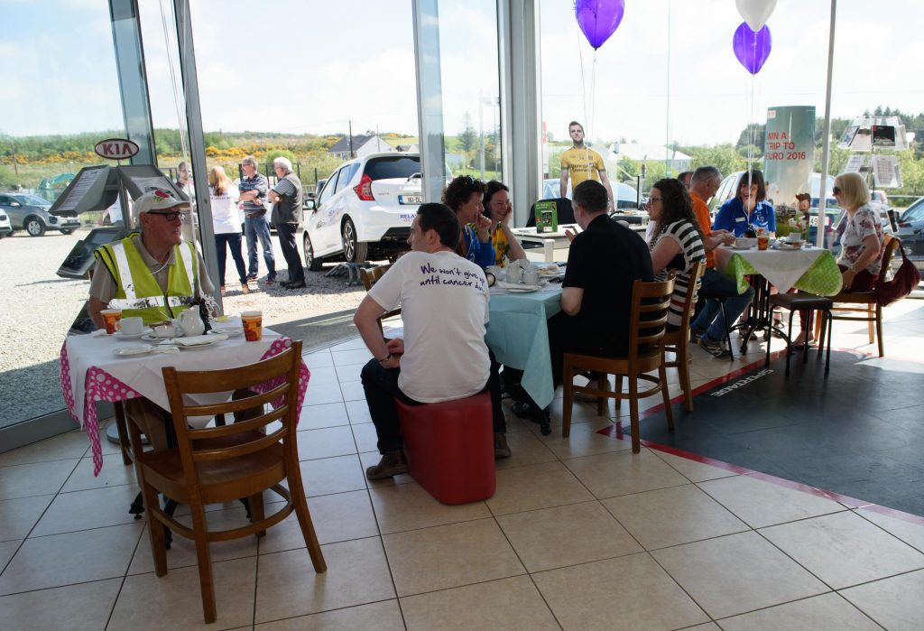 The busy coffee morning at the Inisowen Motors Relay for Life Coffee morning at there garage in Drumkeen, Letterkenny. Photo Clive Wasson
