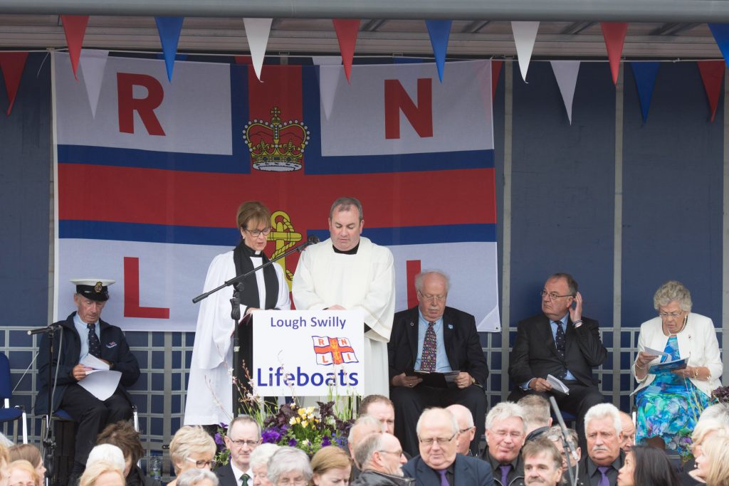 Fr Francis Bradley, Parish Priest of Buncrana and Reverend Judi McGaffin, Church of Ireland Rector dedicating the newly names lifeboat at the naming ceremony and service of dedication of the Shannon Class lifeboat 13-08 Derek Bullivant at Lough Swilly Lifeboat Station on Saturday the 25th of June.  Photo - Clive Wasson
