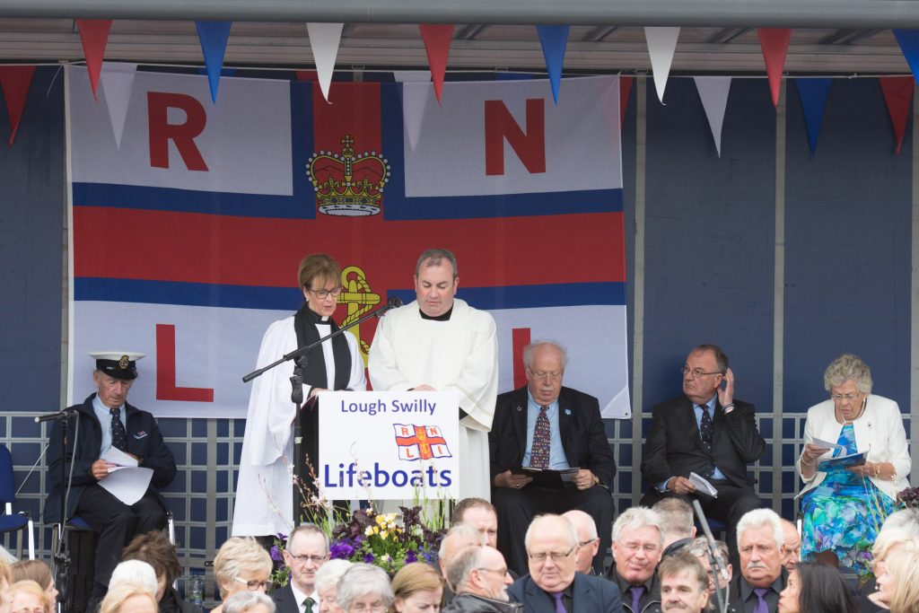 Fr Francis Bradley, Parish Priest of Buncrana and Reverend Judi McGaffin, Church of Ireland Rector dedicating the newly names lifeboat at the naming ceremony and service of dedication of the Shannon Class lifeboat 13-08 Derek Bullivant at Lough Swilly Lifeboat Station on Saturday the 25th of June. Photo - Clive Wasson
