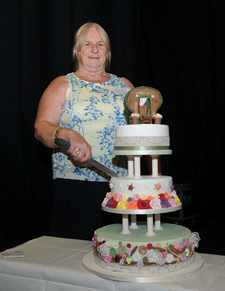 Annie Mongan cutting the cake at the Donegal Traveller Project 20th Anniversary event in the Regional Cultural Centre. Photo Clive Wasson