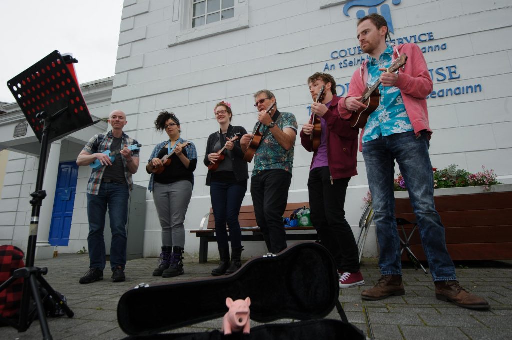 Anthony Cauldwell, Finn Blache, Ineke Abbas, Donal Kavanagh, Kieran Devlin and Conor Sweeney taking part in the Letterkenny Chamber Shop LK busking Competition in Letterkenny on Saturday last.  Photo Clive Wasson