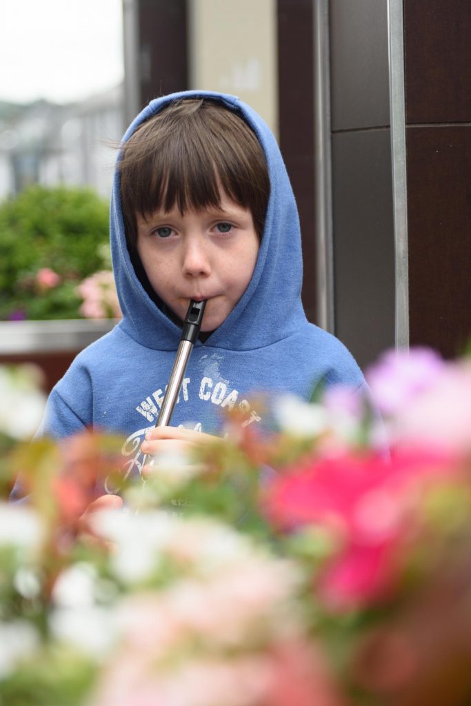 Conor McCarthy from Carrigart taking part in the Letterkenny Chamber Shop LK busking Competition in Letterkenny on Saturday last.  Photo Clive Wasson