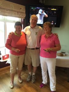Lady Captain Mary Lafferty, Captain Denis Martin, and Lady President Margaret Witherow after the sponsored walk.
