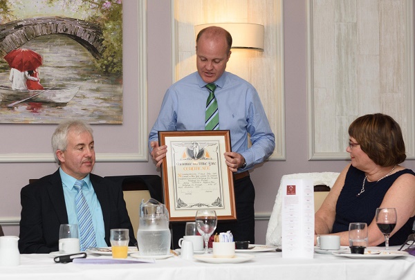 Sub-Station Officer Shaun Curran accepting the Certificate of Bravery with Joseph McTaggart , Chief Fire Office, (left) and Deirdre Friel, (right) who nominated the service for the award at a special event to mark the bravery of fire fighters from Killybegs who battled flames in a blazing building to save the life of an elderly lady was held on Saturday night (16th July) in The Tara Hotel, Killybegs. The event was hosted by Donegal County Council to acknowledge Killybegs Fire Brigade who received a Certificate of Bravery at the National Bravery Awards Ceremony held on the 13th November 2015 in Dublin . Photo Clive Wasson