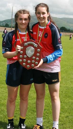 Sinéad Mac Intyre and Shannon Cunningham - who both played for the County U14 team this year   celebrate their success
