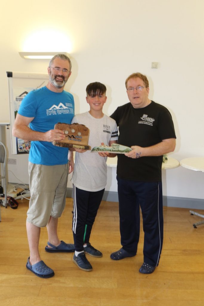 Aidan Cutliffe, Junior winner, Kathleen Causeway Coins Perpetual Trophy, with Mark Loughridge, Danny Ruddy