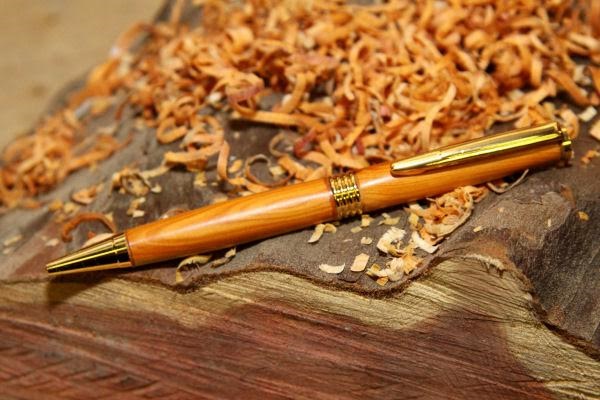 A Yew Streamline pen produced by Donegal Pens.