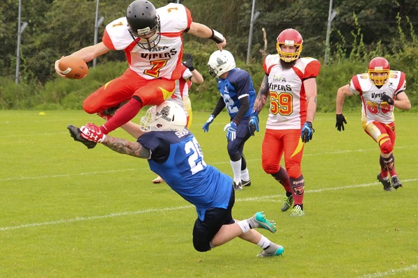 Danny Mullen hurdles a defensive player