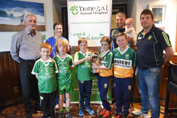 CLG Bord Inis Eoghan Chairman Gerard Callaghan, Childhood Cancer Foundation Representative Maura Toner, Donegal Animal Hospital's Eamon Ward who are the main sponsors, Pat Mc Laughlin, Secretary Inishowen Board and under 9 players from Glenswilly and Buncrana Clubs at the launch of the CLG Bord Inis Eoghan league finals at Harry's Restaurant Burt.