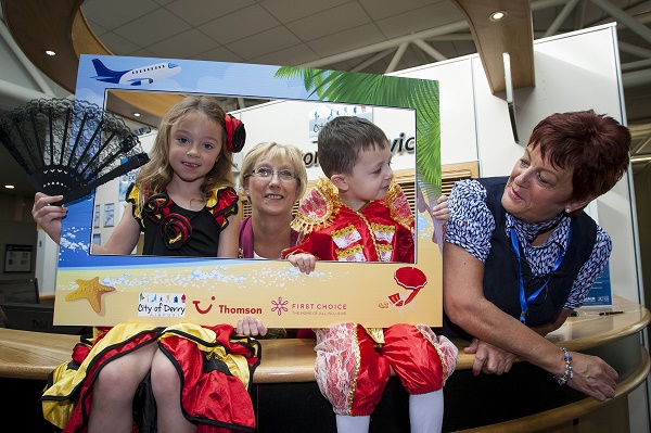 The Mayor of Derry City and Strabane District Council, Alderman HIllary McClintock pictured at City of Derry Airport on Thursday for the launch of Thomson's new City of Derry to Majorca route. Included are local children Leyton (4) and Amaira (6) Shongo, and Kay Doherty, Terminal Services, City of Derry Airport.