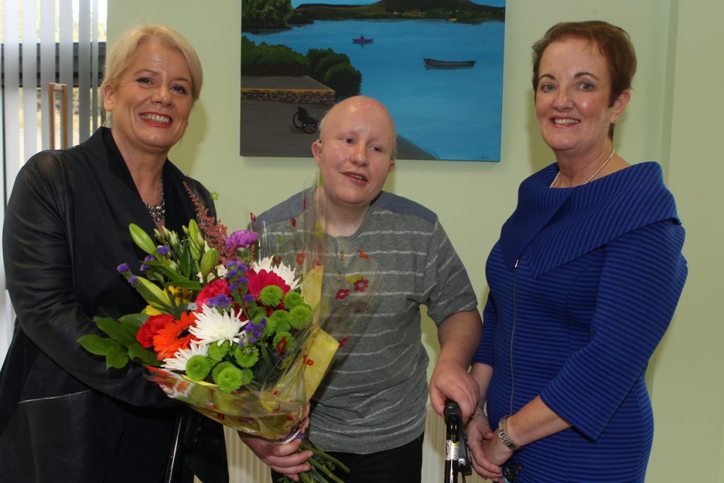 Daniel Mc Brearty who made a presentation to the CEO of the Irish Wheelchair Association, Rosemary Keogh, at the opening of the new IWA centre pictured with Manager of the centre Mary Mc Grenra. Photo Brian McDaid