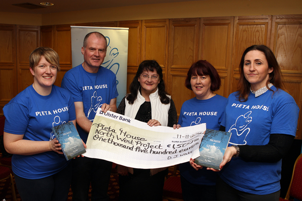 Daphne J Watt makes a presentation to Pieta House for Û1,500 making her total of Û5,000 so far from the sale of her book "Promises of Spring" included from left are, Donna Campbell Danny Devlin Anastasia Rouche and Paula Coyle. Photo Brian McDaid