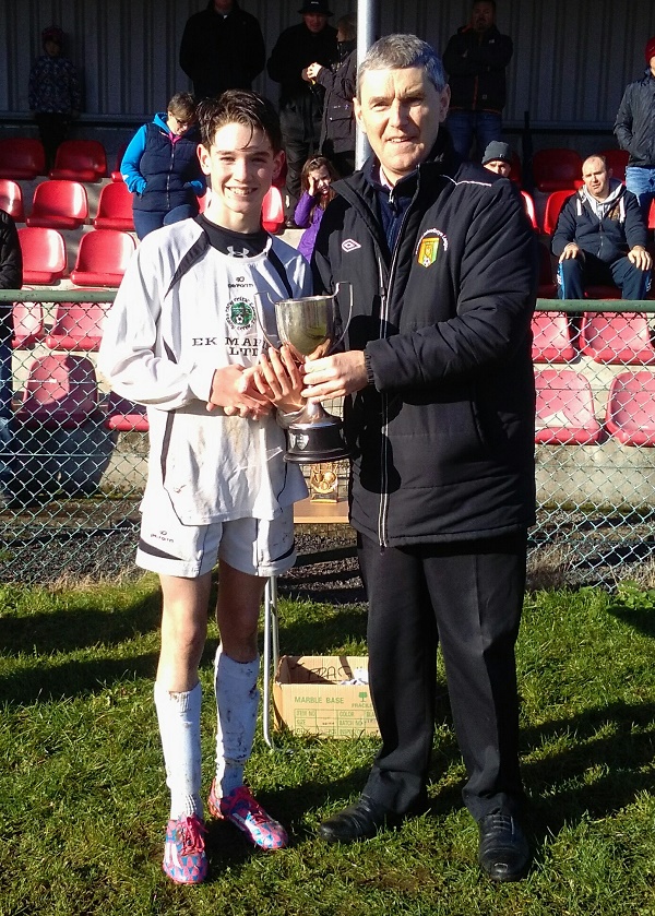 Eany captain on the day Conor Campbell receiving the League trophy from League Chairman Ian Curristan
