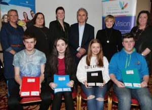 Members of the Letterkenny Youth group including Jay Harkin, Niamh McHugh, Courtney McDevitt and Michael Mc Shane who received their certificates with special guests, standing from left, Charlene Logue and Sheena Boyle Laverty, Donegal Youth Service, Mary Moy, programme Manager, IFI, Paddy Harte, board member, IFI, Lorraine Thompson and Helen Simms, Donegal Youth Service.