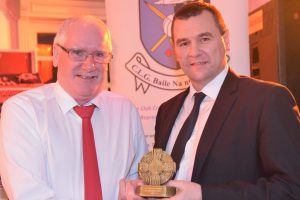Brendan Ward receives the Scor Appreciation Award from County Chairman Sean Dunnion at the Annual Awards Presentation in Mulroy Woods.