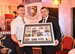 Donegal Chairman Sean Dunnion presents Donegal Minor Manager Shaun Paul Barrett with a framed photo on behalf of Milford GAA Club in recognition of his achievements with the Donegal Minor team of 2016.
