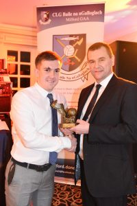Donegal Chairman Sean Dunnion presents Darragh Black with Young Player of the Year Award at the Annual Club Presentation at Mulroy Woods.